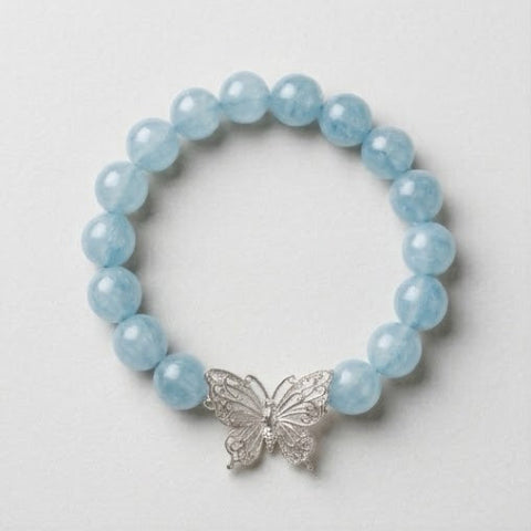 AuraGems 8mm natural aquamarine beaded bracelet with a 925 sterling silver butterfly charm